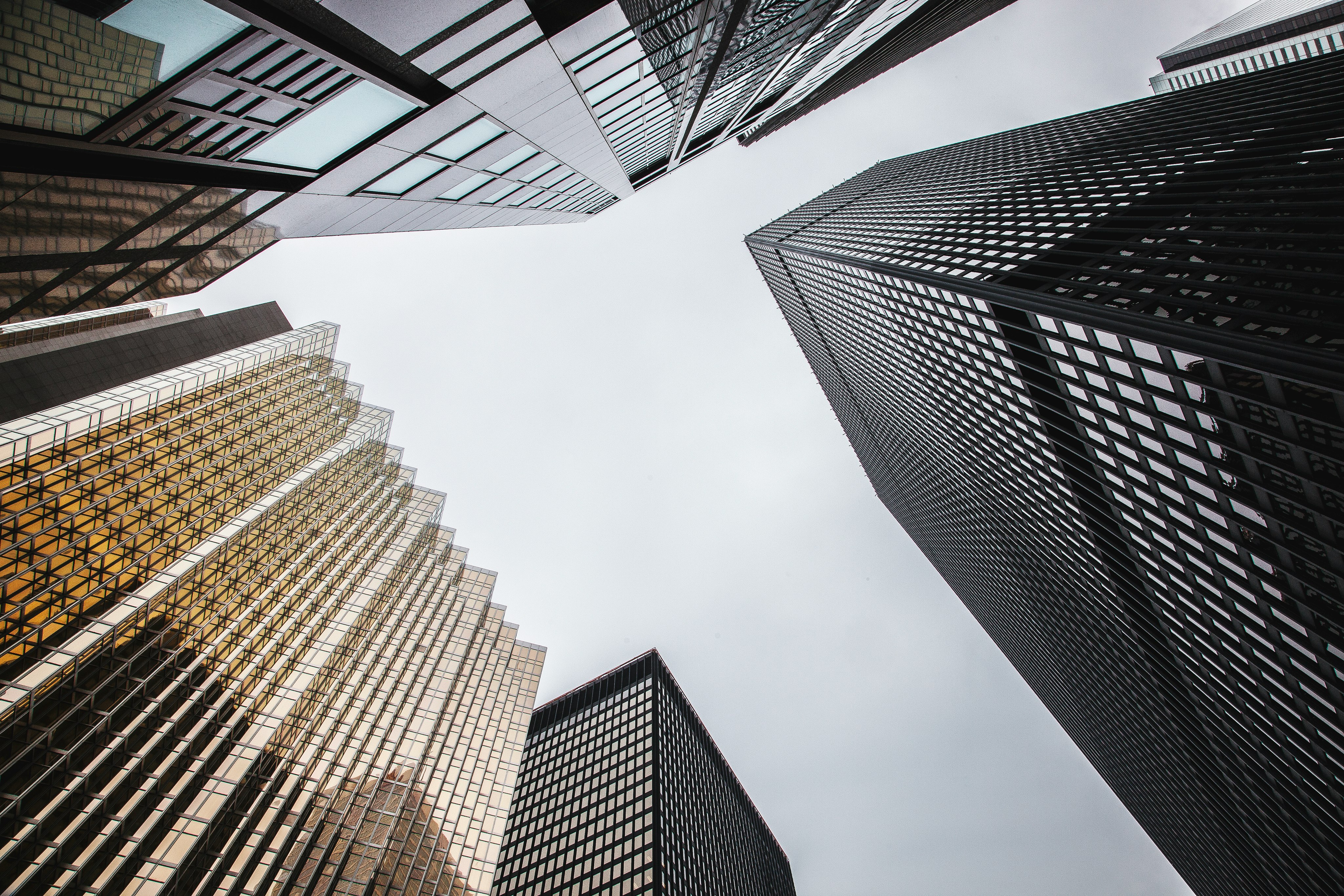 low-angle photography of high-rise buildings